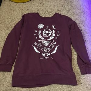 Kendall and Kylie sweatshirt, fits to size but isn’t too tight